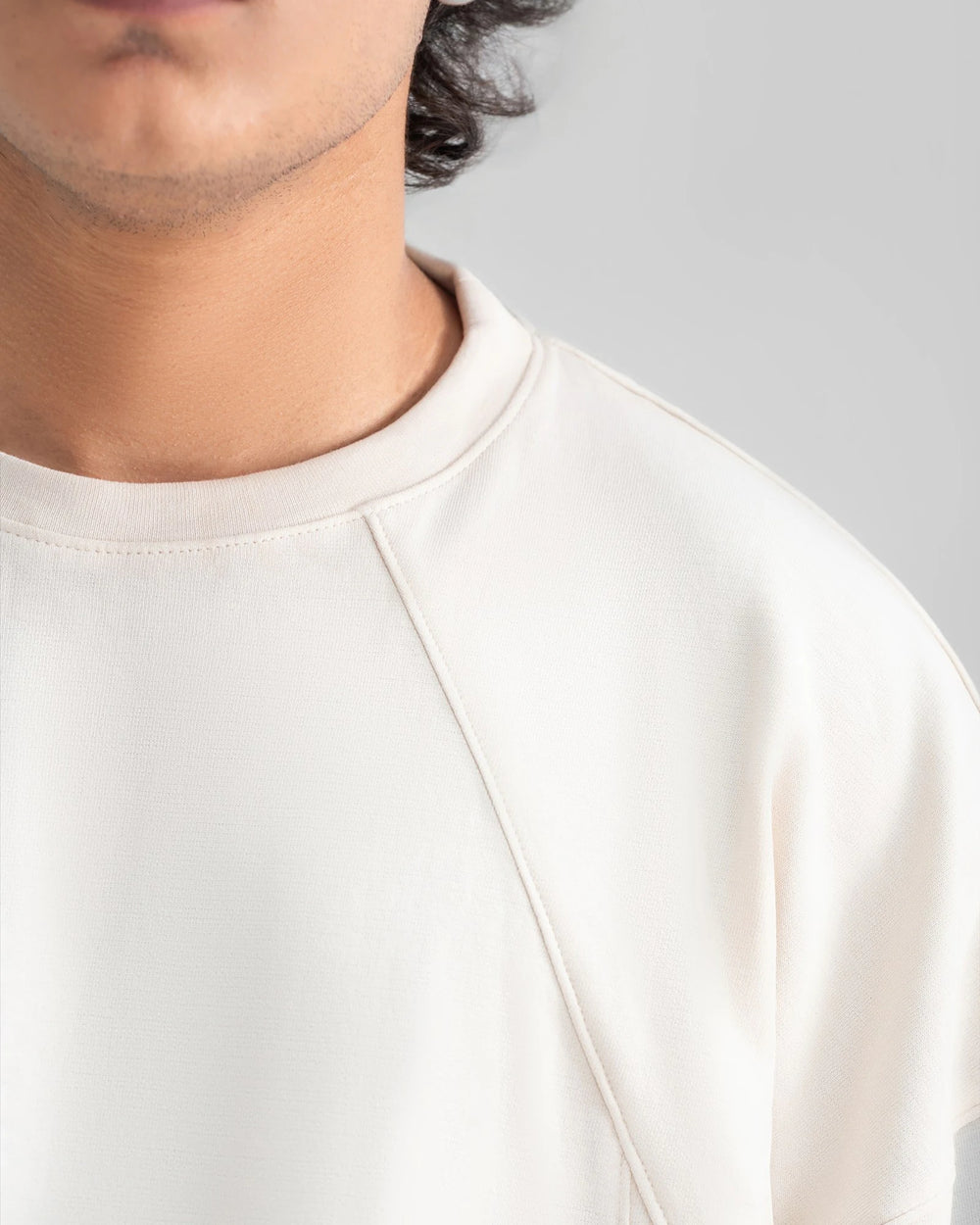 Exaggerated Oversized Panel Tee — Cream — Garment close