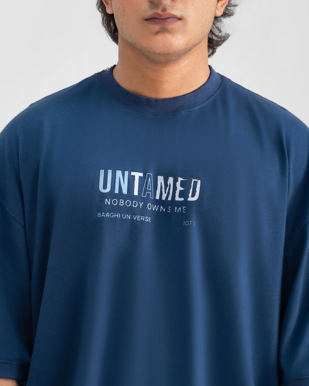 UNTAMED Oversized Tee — Blue — Garment close