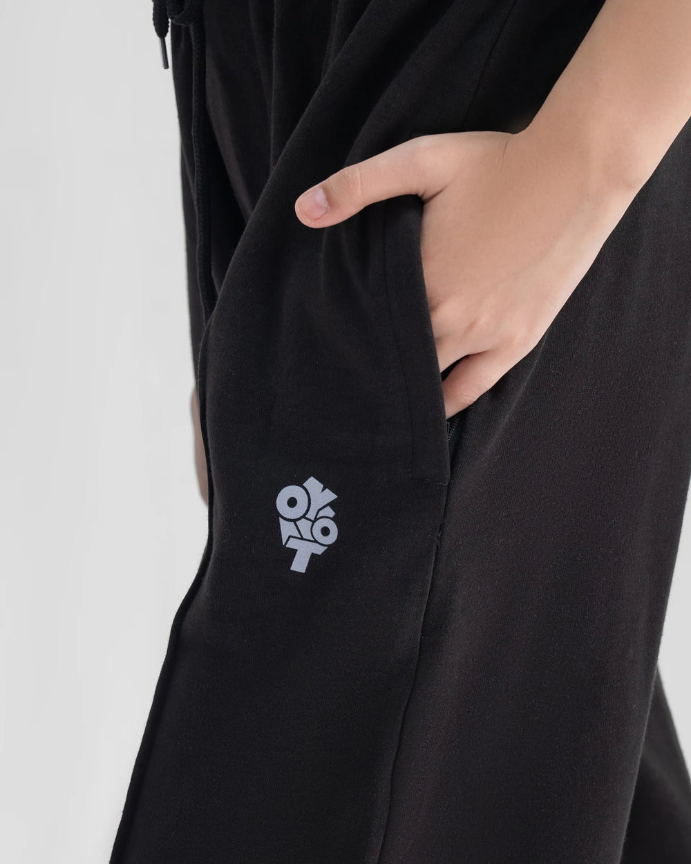 Wide-Leg Drawstring Trousers — Black — Garment close